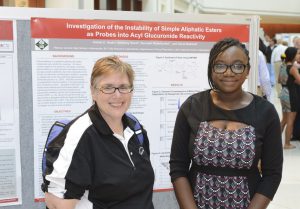 Aishat with Linda Monroe, her Chemistry Teacher from Warren Central HS