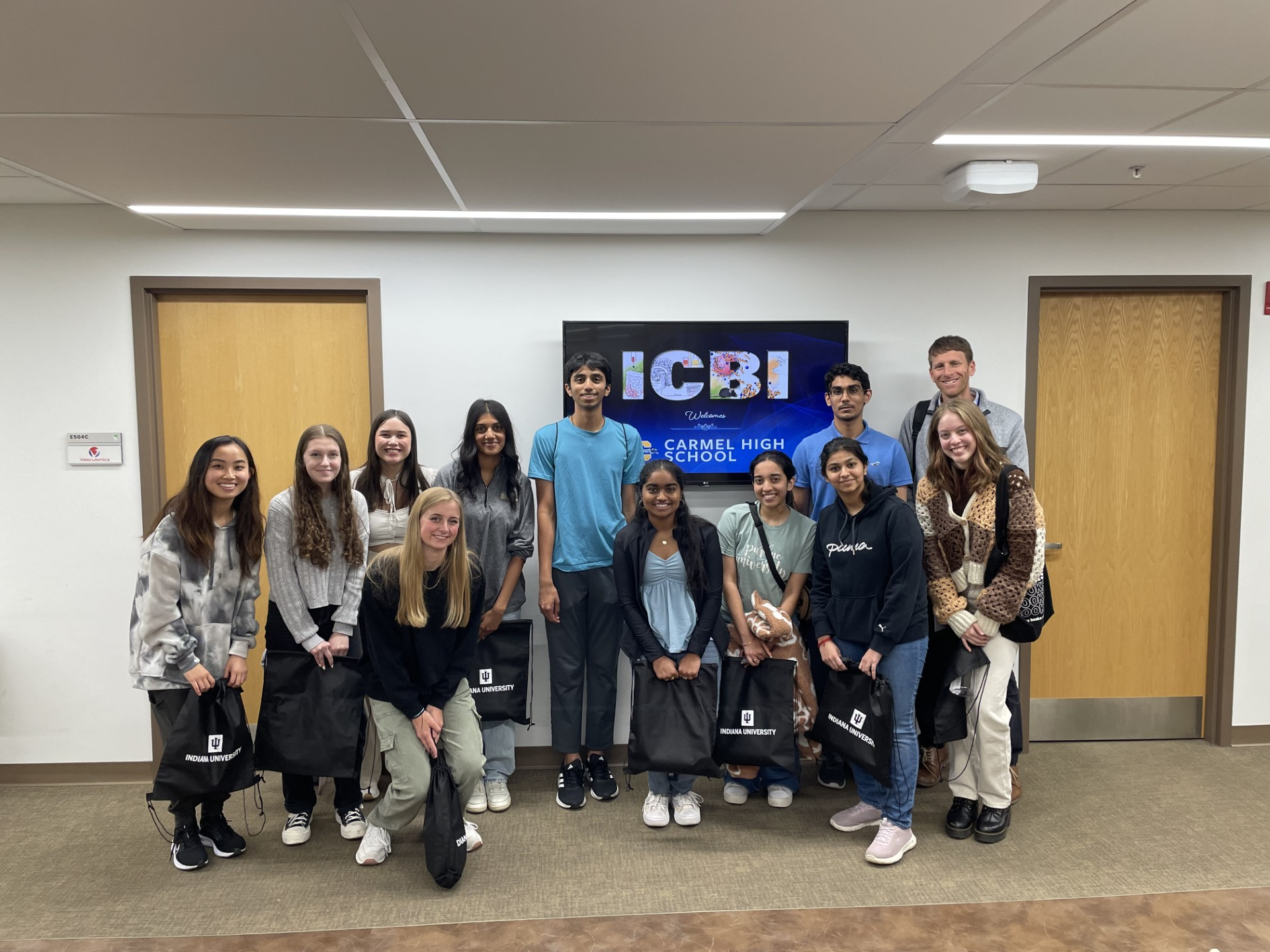 A group of Carmel High School seniors pose together during their visit to the Indiana Center for Biomedical Innovation.