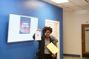 Rev. Shonda Nicole Gladden, CEO, Good to the SOUL presenting to attendees and encouraging them to complete a survey.