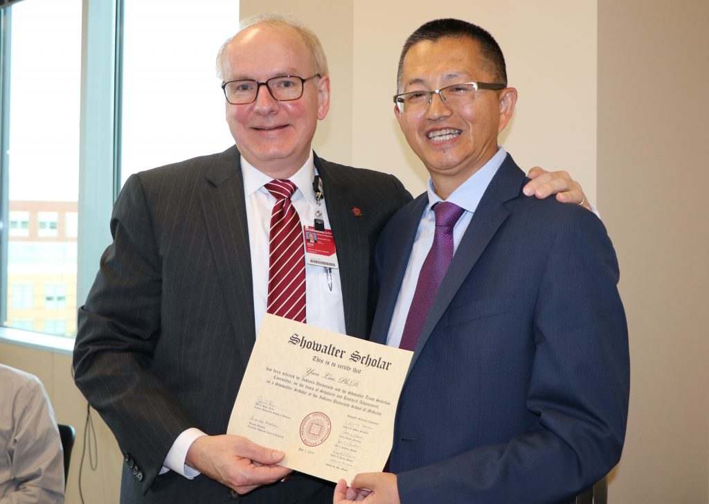 IU School of Medicine Dean Jay Hess, MD, PhD, MHSA with Yan Liu, PhD