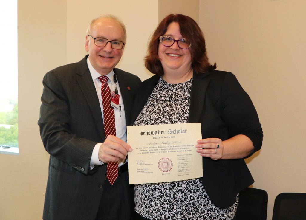 IUSM Dean Jay Hess, MD, PhD, MHSA with Amber Mosley, PhD