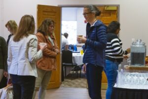 Sarah Wiehe talks to attendee