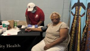 Woman having blood pressure taken