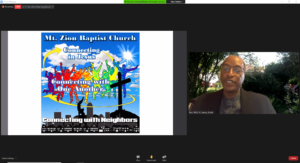 Rev. Dr. Phillip James presents during event