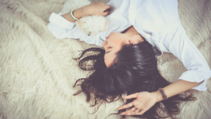 Photo of woman asleep on a bed