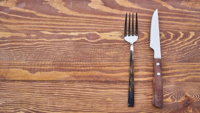 empty table with fork and knife